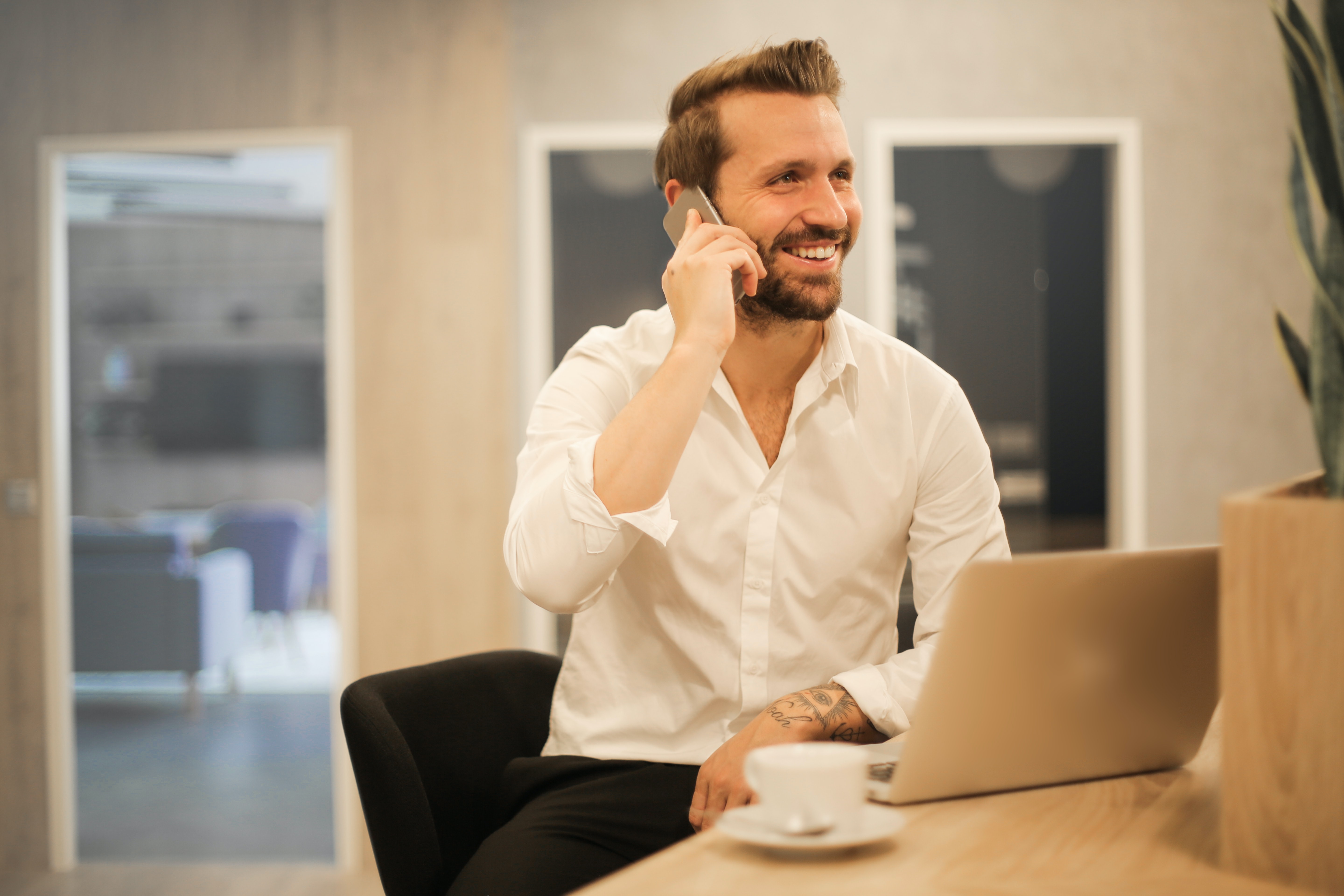 Man on phone smiling