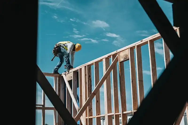 construction-worker-on-house-frame